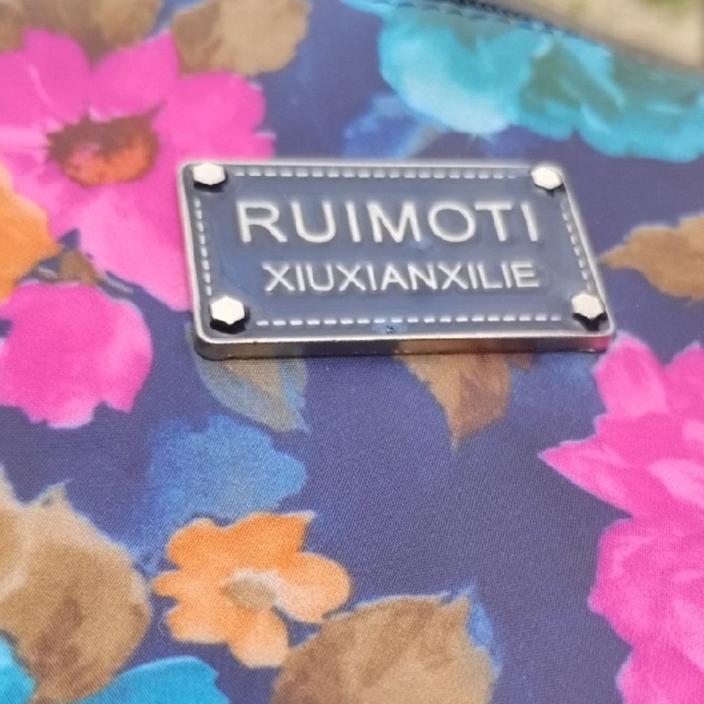 RUIMOTI Floral Crossbody Bag in Navy with Pink & Blue Flowers - Picture 2 of 6